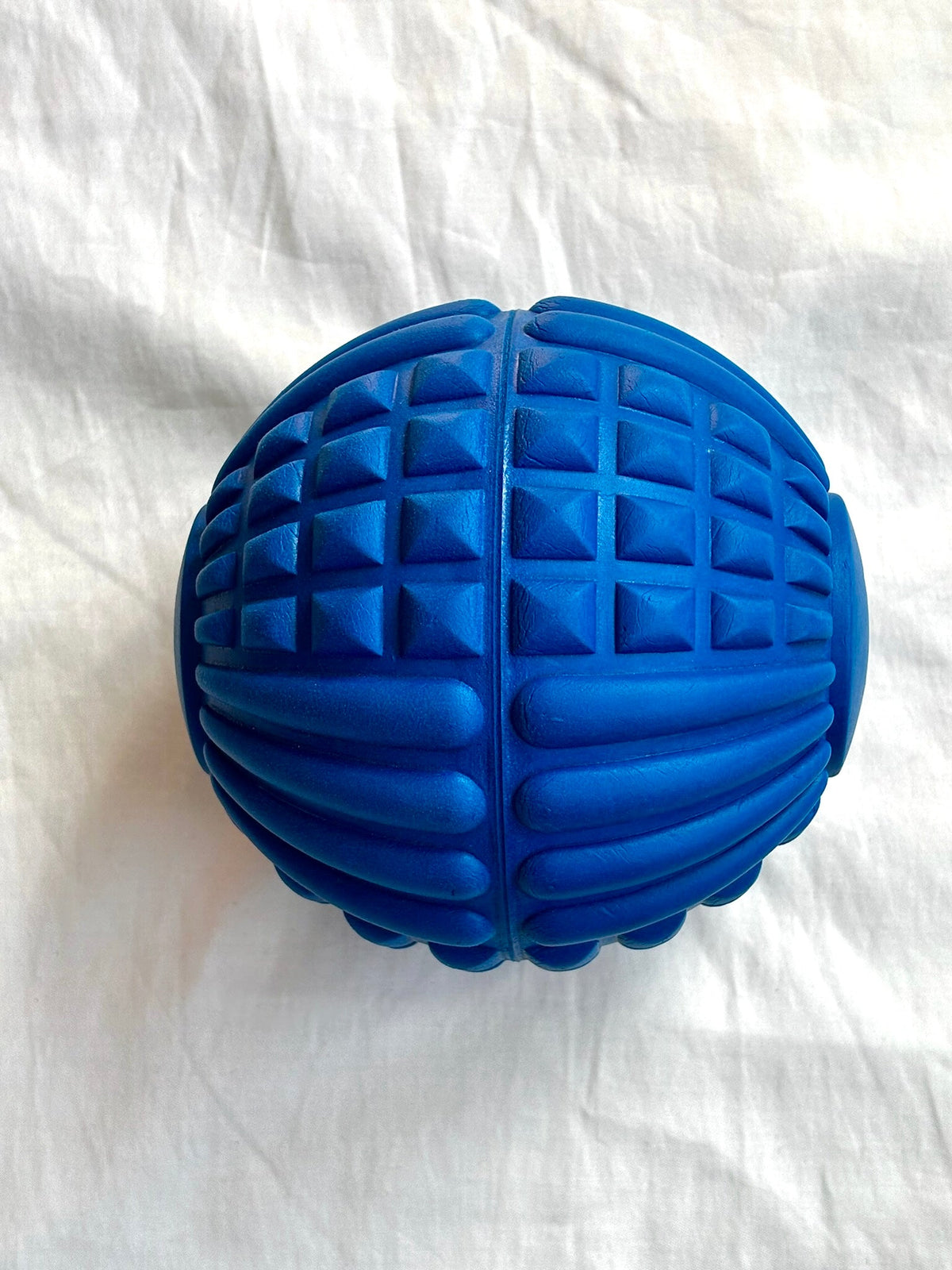 Textured blue Psoas Ball for hip flexor and deep muscle recovery